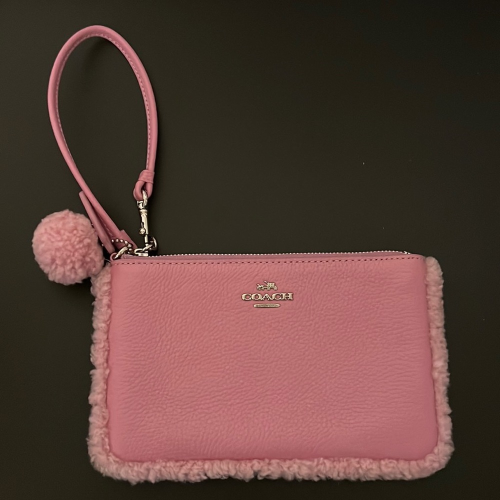 Coach small shearling trimmed leather wristlet